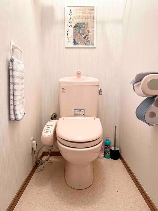 Апартаменты 鶴橋駅徒歩2分 トイレ浴室複数あり3階建て一軒家車庫付き Осака Экстерьер фото