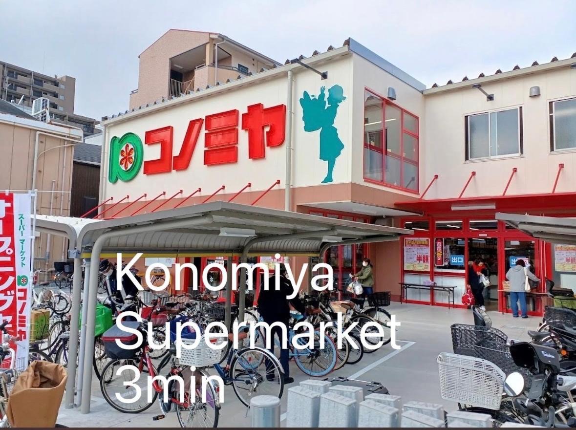 Апартаменты 鶴橋駅徒歩2分 トイレ浴室複数あり3階建て一軒家車庫付き Осака Экстерьер фото